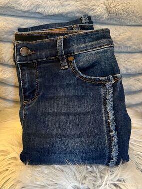 KARL LAGERFELD Dark Blue Distressed Denim Cropped Jeans with Frayed Side Trim.
